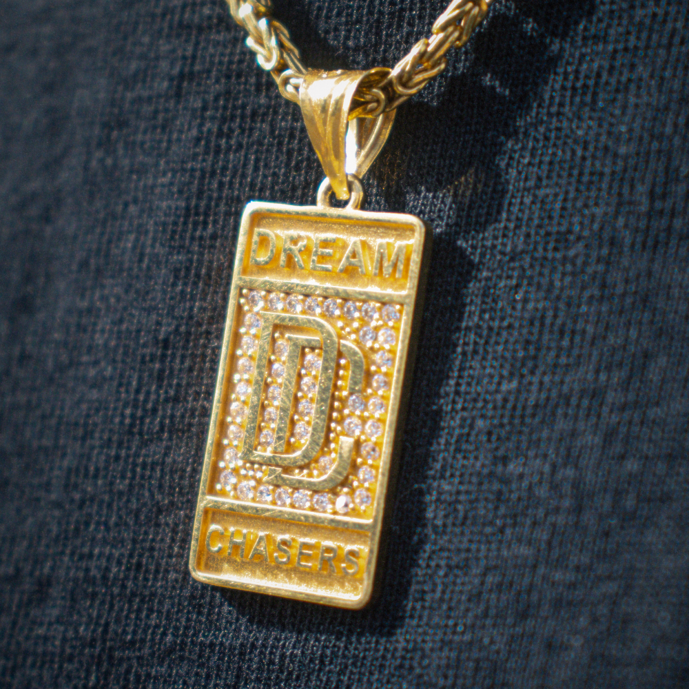 14 KARAT GOLD 'DREAM CHASER' PENDANT - 14 KARAT GOLD -